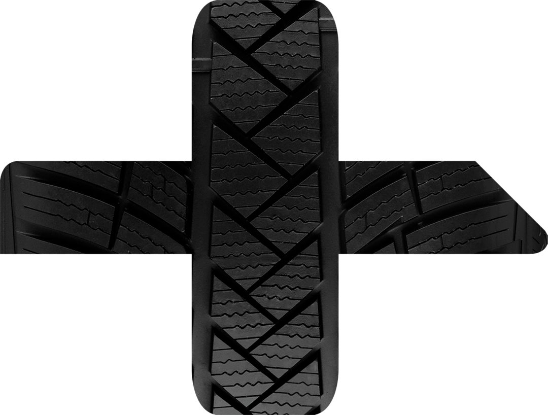 Close-up view of a tyre featuring the recycling symbol.